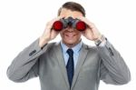 Young Officer Looking Through Binoculars Stock Photo