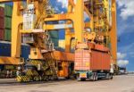 Quay Crane Loading Container From Container Ship To Container Tr Stock Photo