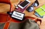 Travel Insurance Tag On Travel Bag Stock Photo