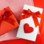 Valentines Gift Box With A Red Bow On Red Background Image Of Va Stock Photo