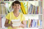 Asian Boy Is Holding Book Stock Photo