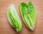 
Food Background And Salad Concept With Fresh Cos Lettuce Flat L Stock Photo