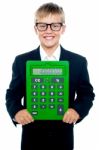 Young boy Showing Calculator Stock Photo