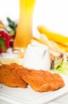 Classic Milanese Veal Cutlets And Vegetables Stock Photo