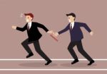 Businessman Fail To Passing The Baton In A Relay Race Competitio Stock Photo