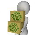Fragile Stamp On Boxes Showing Breakable Or Delicate Products Stock Photo