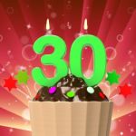 Thirty Candle On Cupcake Means Colourful Party Or Decorated Cake Stock Photo
