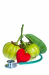 Garcinia Cambogia, Red Heart-shaped And Stethoscope On White Background Stock Photo