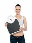 Woman Holding Weighing Scales Stock Photo