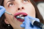 Close-up Medical Dentist Procedure Of Teeth Polish Stock Photo