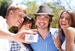 Group Of Happy Smiling Couples Taking Picture Together Stock Photo