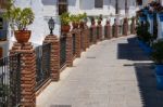 Mijas, Andalucia/spain - July 3 : View Of Brick Piers And Blue F Stock Photo