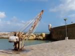 Lagos, Algarve/portugal - March 5 : Old Crane Outside Fort Ponta Stock Photo