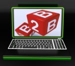 B2b Dices On Laptop Showing Online Commerce Stock Photo