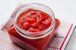 Pureed Tomatoes In A Glass Jar Stock Photo