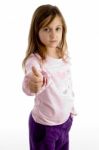 Cute Girl Showing Thumbs Up Stock Photo