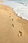 Footprints On Beach Stock Photo