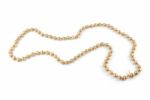 Pearl Necklace Racing Track On White Stock Photo