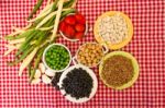 Variety Of Kitchen Ingredients With Fresh And Dried Legumes Stock Photo