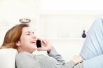 Woman Have Joyful Talk Over Phone Stock Photo
