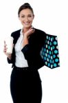 Woman Holding Coffee Cup And Shopping Bag Stock Photo