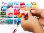 Choosing Beads For Necklace Stock Photo