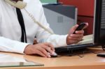 Businessman Using Smart Phone During Working Stock Photo