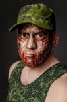 Military Style Camouflage On The Soldier's Face Stock Photo