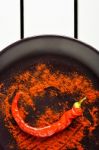Red Pepper With Ground Paprika Stock Photo