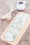 Chinese Leek Steamed Dessert On Wooden Table Stock Photo