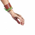 Mehendi Or Henna Tatoo On The Female Hands In Bracelets Isolated Stock Photo