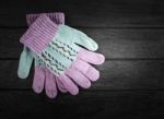 Winter Gloves On Wooden Boards Stock Photo