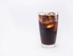 Soft Drink Is Cool With Ice Cubes In Full Glass On White Background Stock Photo