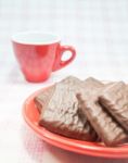 Milk Chocolate Pieces And Coffee Cup Stock Photo