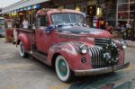 Old Vintage Red Chevrolet Truck At Night Market, Srinakarin Road Stock Photo