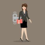 Business Woman With Wind-up Key In Her Back Stock Photo