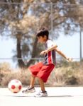 Young Kid In Action Stock Photo