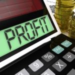 Profit Calculator Shows Surplus Earnings And Returns Stock Photo
