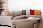Modern Couch With Coloured Pillow Stock Photo