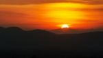 Sunset Over Mountain Range Stock Photo
