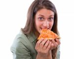 Teenage Girl Eating Pizza Stock Photo