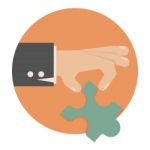 Hand With Puzzle Stock Photo