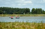 People Canoeing On The River Alde Stock Photo