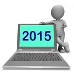 Two Thousand And Fifteen Character And Laptop Shows Year 2015 Stock Photo