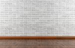 White Stone Wall And Parquet Floor Stock Photo