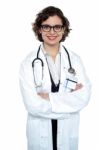 Bespectacled Lady Doctor Posing Confidently Stock Photo
