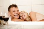 Happy Couple Bathing Stock Photo
