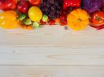 Colorful Fresh Fruits And Vegetables On Wood Background, Healthy Stock Photo