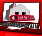 Home Sweet Home House Laptop Shows Comforts And Family Stock Photo
