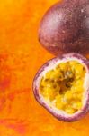 Passion Fruit On The Terracotta Background Vertical Stock Photo